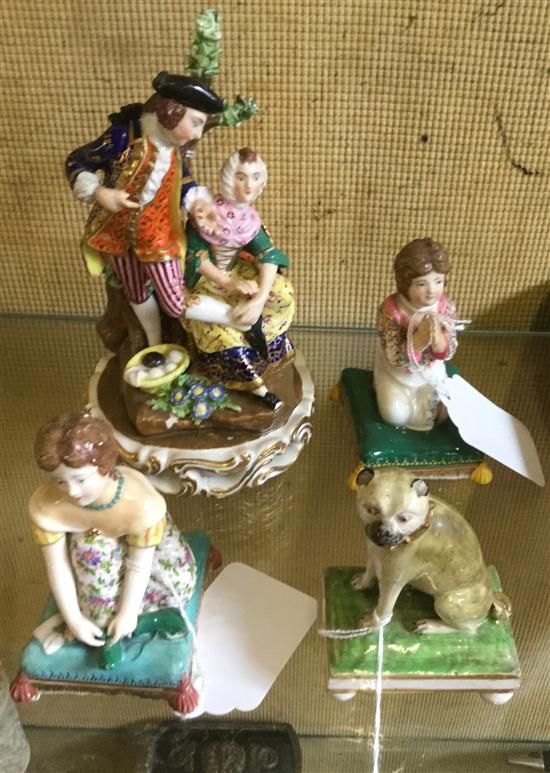 Derby porcelain figures - a pug dog, the shoe polisher and two girls on pillows